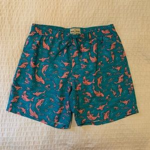 Chubbie’s Pink and teal shark swim trunks